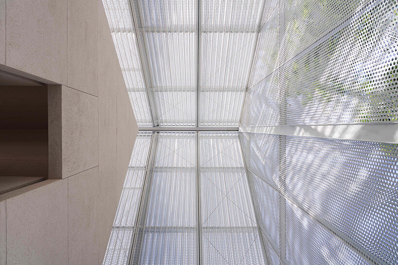 handrails with arched profiles encourage visitors to linger | image by Sanif