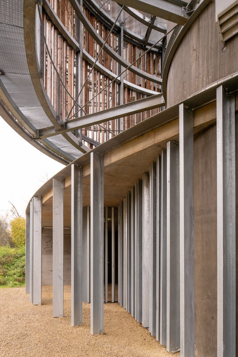 Temperaturas Extremas' wood and cork towers create water reservoir and wildlife shelter in luxembourg forest