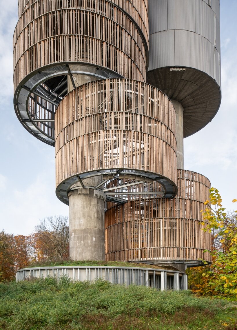 Temperaturas Extremas' wood and cork towers create water reservoir and wildlife shelter in luxembourg forest