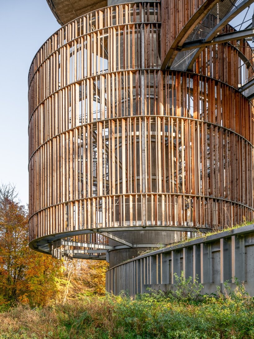 Arquitecturas Extremas' wood and cork towers create water reservoir and wildlife shelter in luxembourg forest