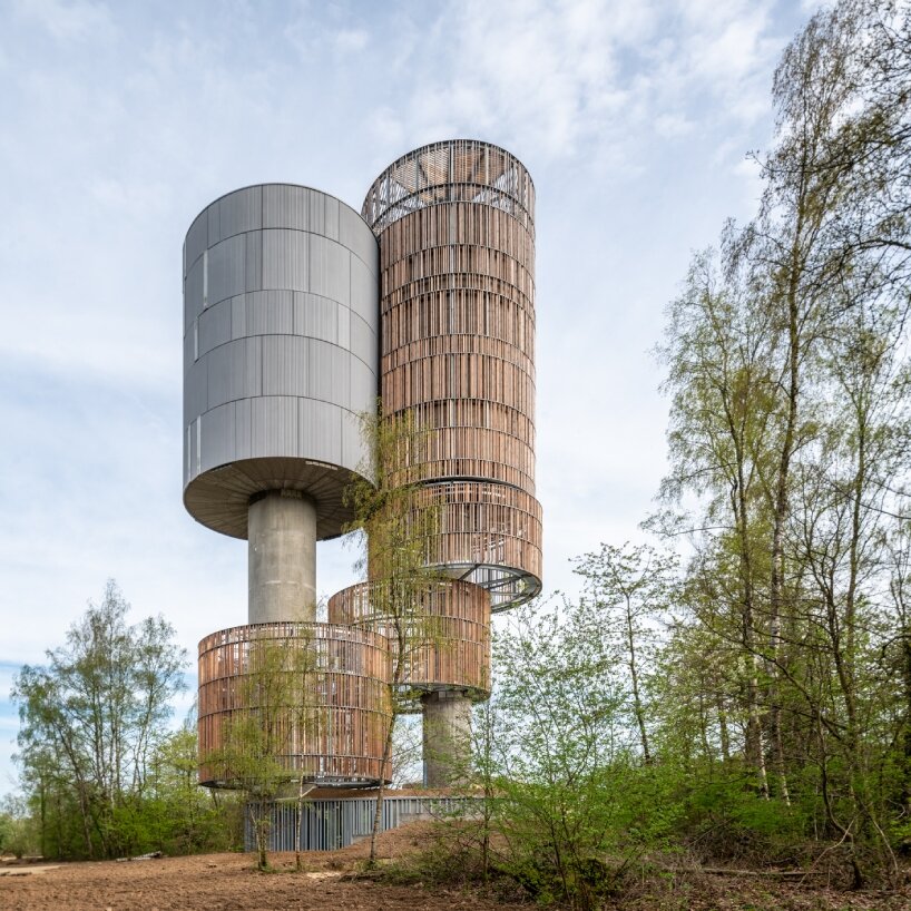 Temperaturas Extremas' wood and cork towers create water reservoir and wildlife shelter in luxembourg forest