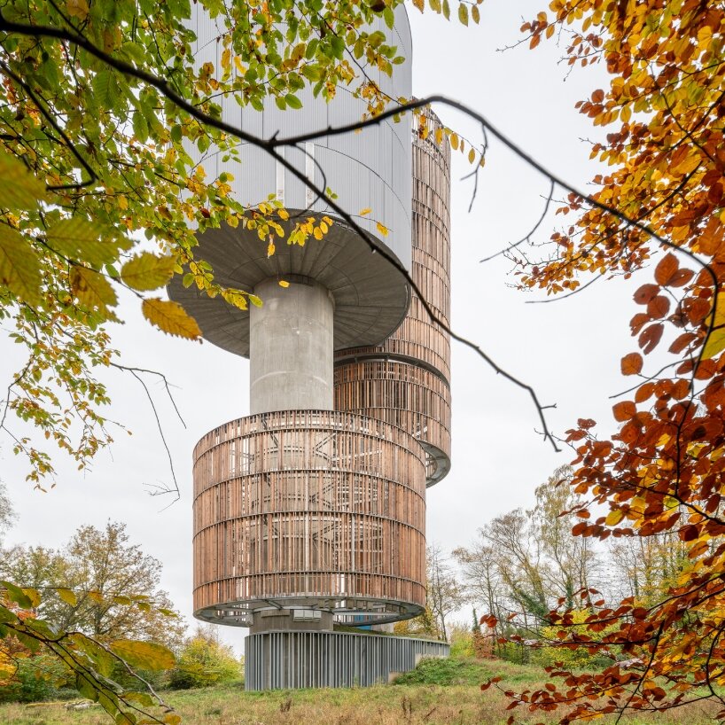 Temperaturas Extremas' wood and cork towers create water reservoir and wildlife shelter in luxembourg forest
