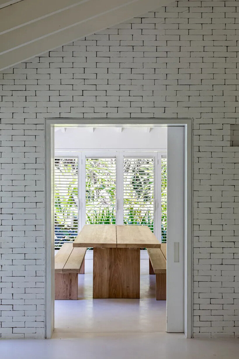 exposed brick provides a warm focal point in the family room