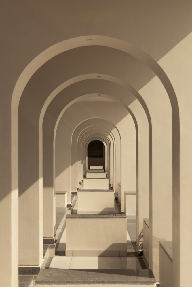 fixed furniture breaking the monotony of the space and adding visual interest to the overall composition