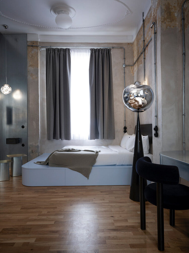 soft blue details complete the interior of the suite