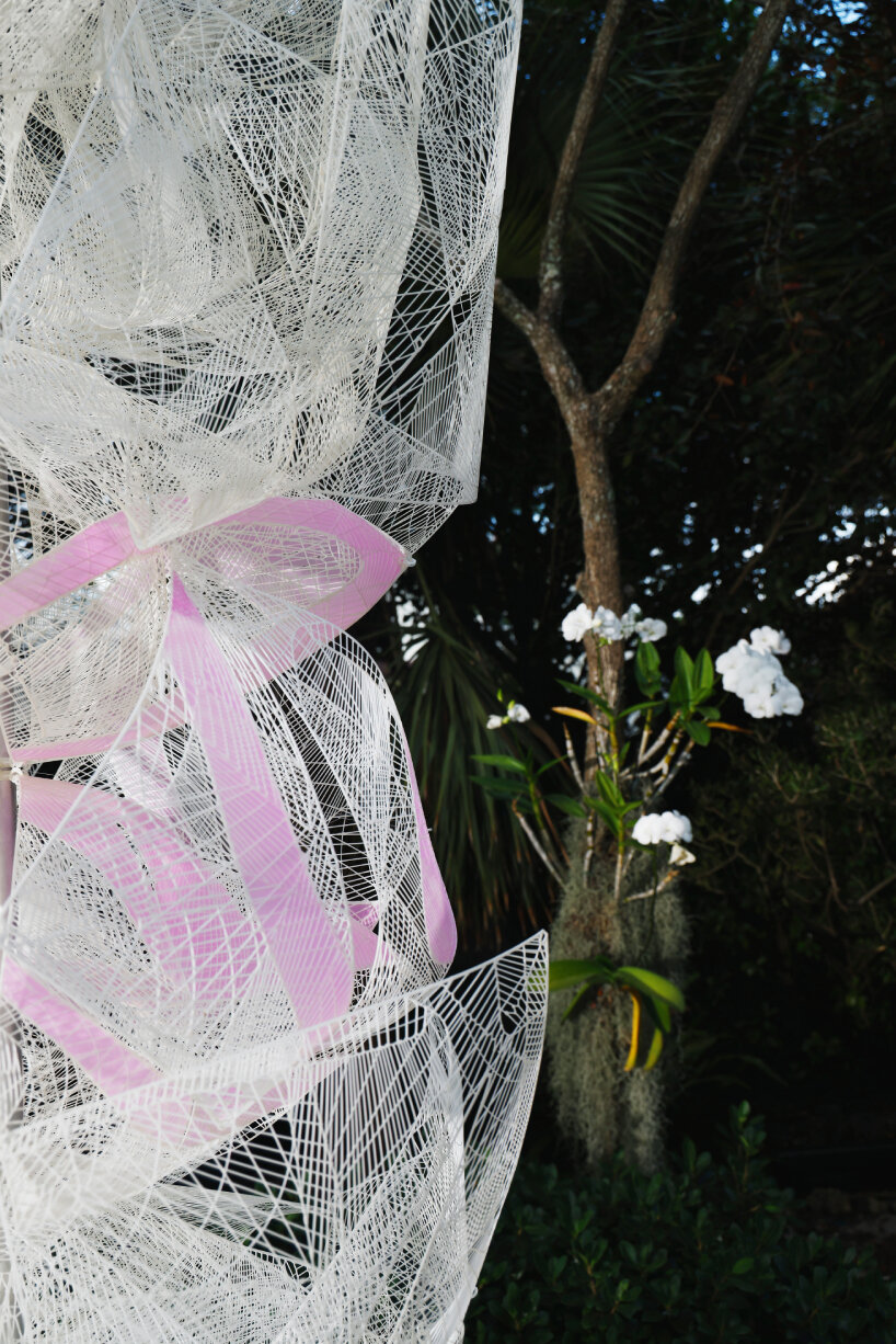 when it gets triggered, it subtly reveals the Lexus logo across its structure