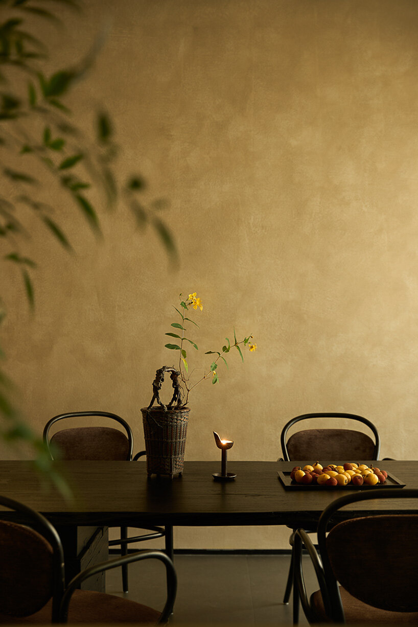 warm tones and organic materials create a calming ambiance