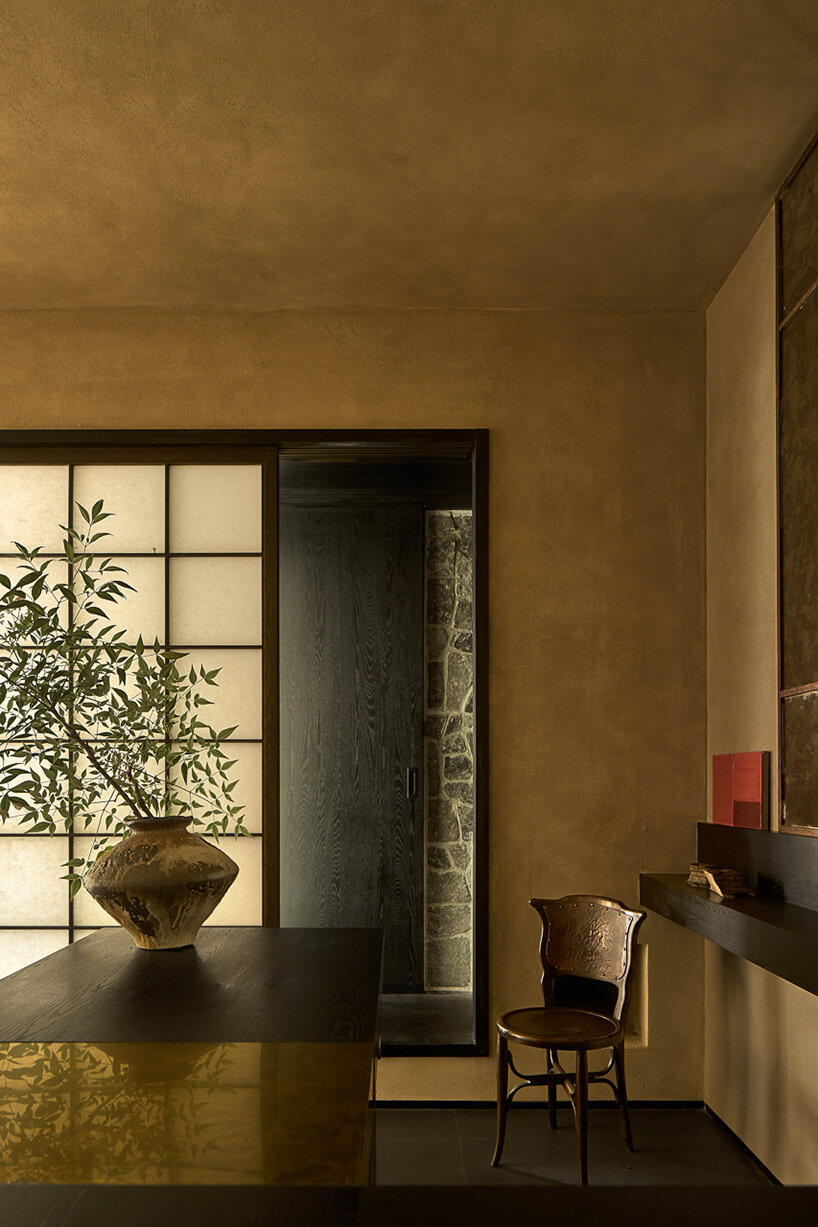 the interplay of light and shade transforms the XinHeYe Tea House throughout the day