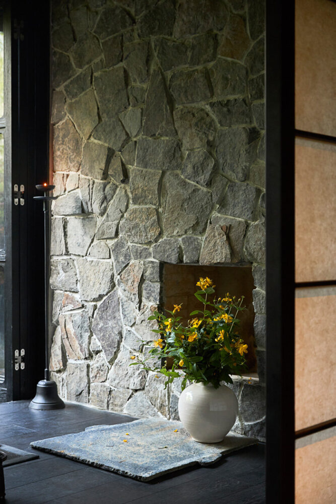 stone walls in the lobby introduce a tactile quality to the space