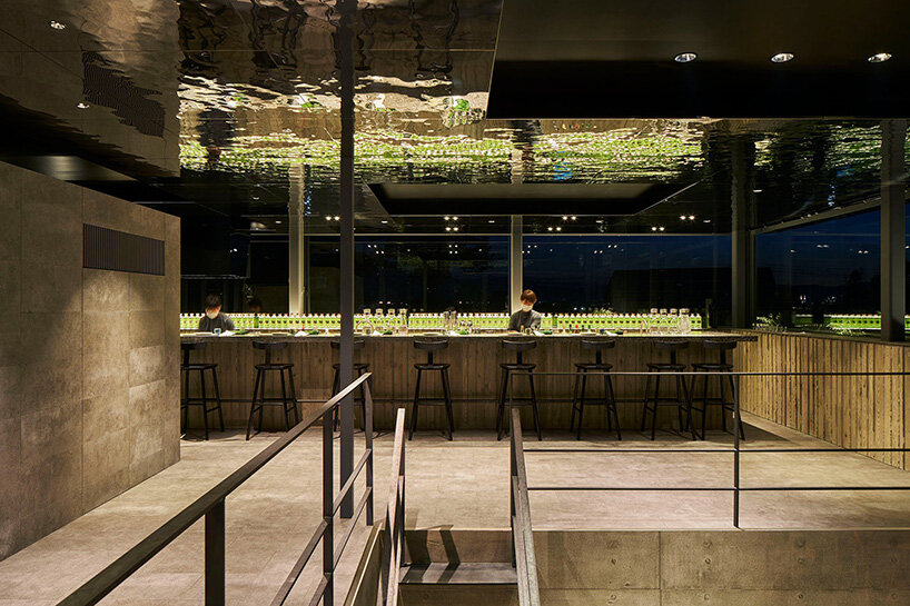 reversed perimeter beams are used as flower beds 