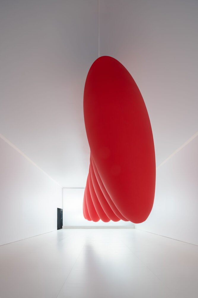pendular motion captivates the viewer, transforming the space into a meditative realm