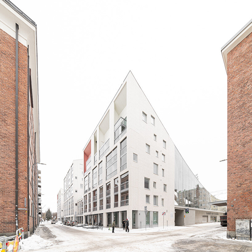 glass-walled entrances shield the field from the wind | image by Hannu Rytky