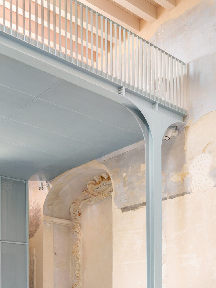 the contemporary structural addition introduces a vertical division