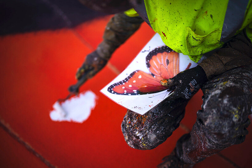 the piece was completed over six weeks and requiring 400 hours of painting and 200 gallons of paint