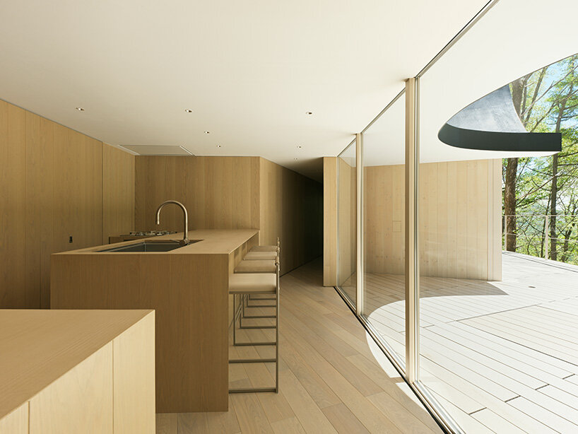 wooden surfaces add warmth to the interior