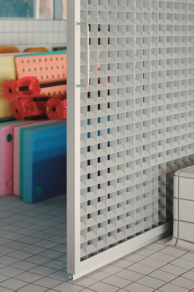 steel sliding doors separate the space