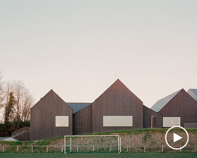 raum envelops renovated brittany pool and spa in black timber skin for thermal insulation