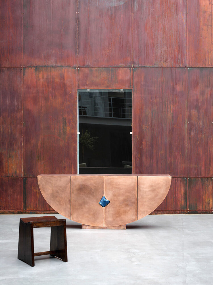 sculptural pieces by Pierre de Valck frame archaeological fragments in aluminum and bronze