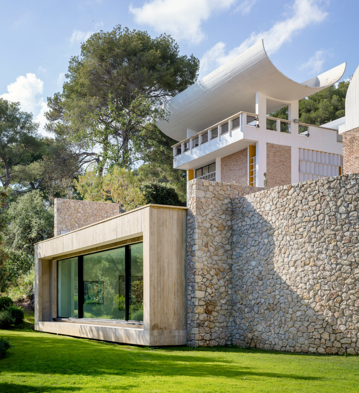 silvio d'ascia carves gallery extension beneath stone walls of fondation maeght in france 