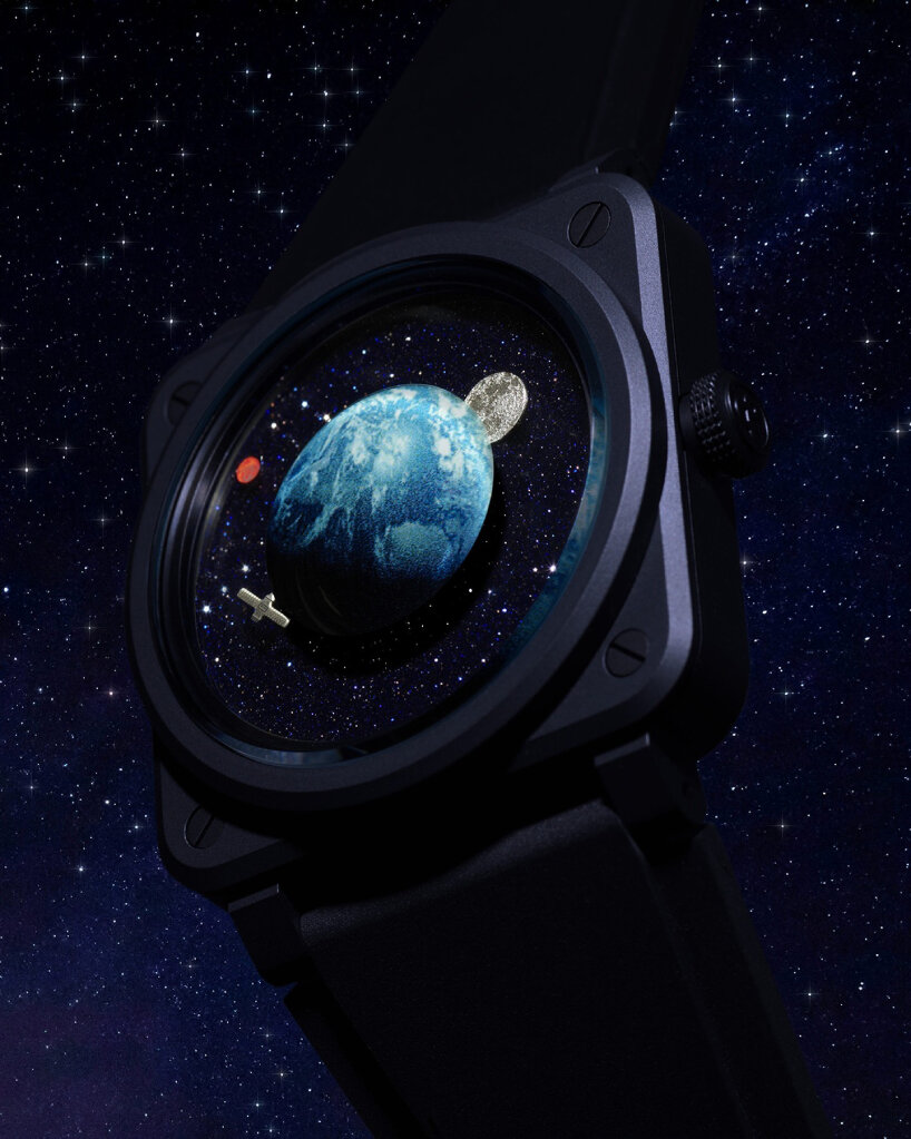 both the Moon and the satellite are in laser-engraved metal