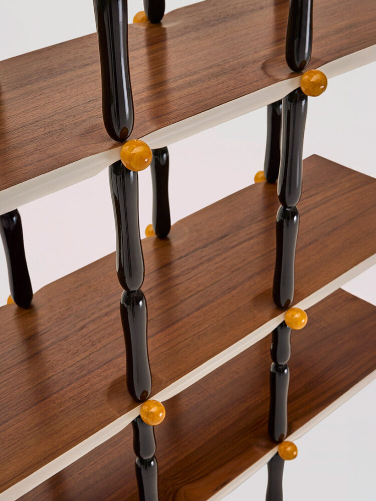 the design combines rustic warmth with sleek black structural elements