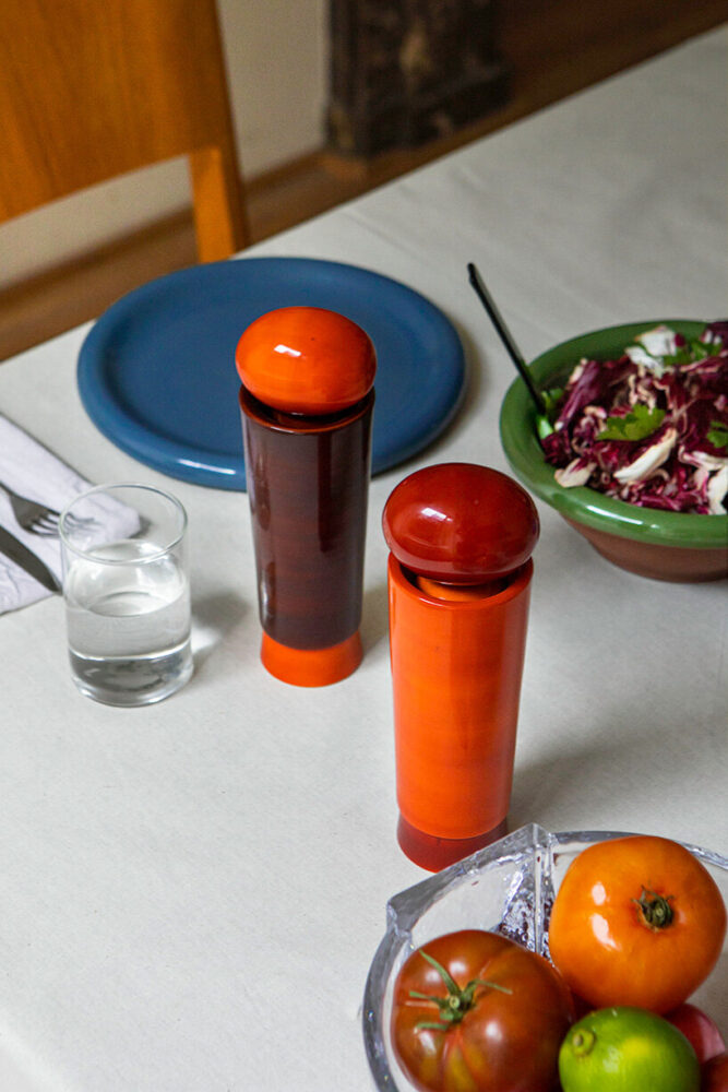 the grinders are covered in natural dyes sourced from turmeric, kumkum, and indigo