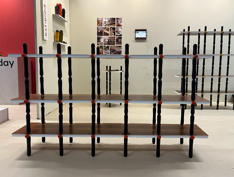 in this year’s showcase, the designer duo features sculptural shelving from reclaimed wood | image © designboom
