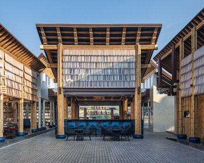 interlaced bamboo skin wraps restaurant's facades in thailand