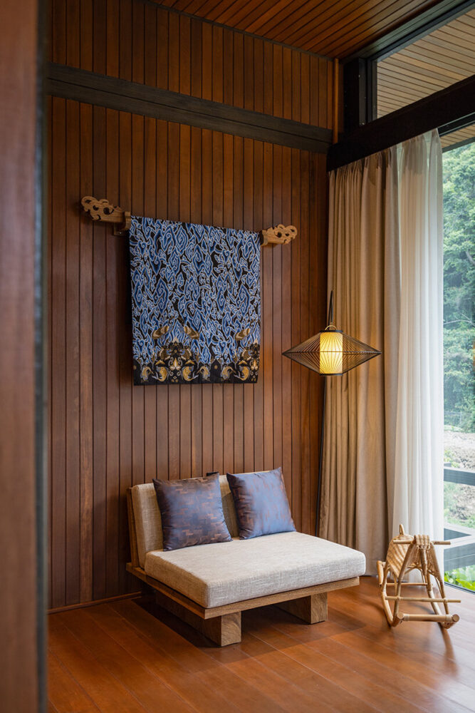 adorned with rich nyatoh wood panels, enhancing both walls and floors
