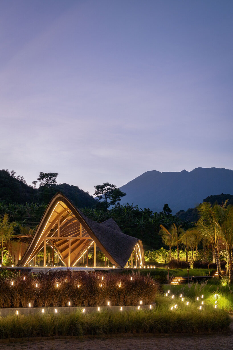 undulating wood and bamboo top k-thengono's wedding compound in indonesia countryside 