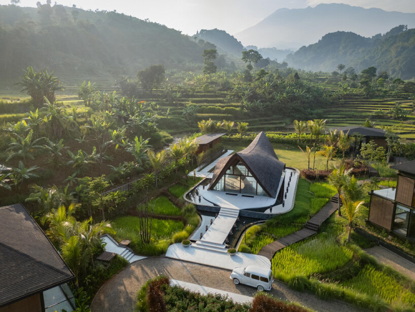undulating wood and bamboo top k-thengono's wedding compound in indonesia countryside 