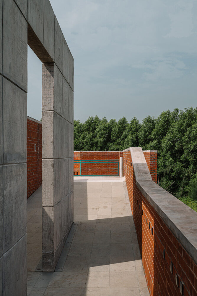 turqoise-colored railing completes the project