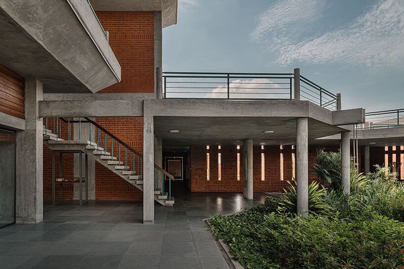 originally conceived as a partially underground structure