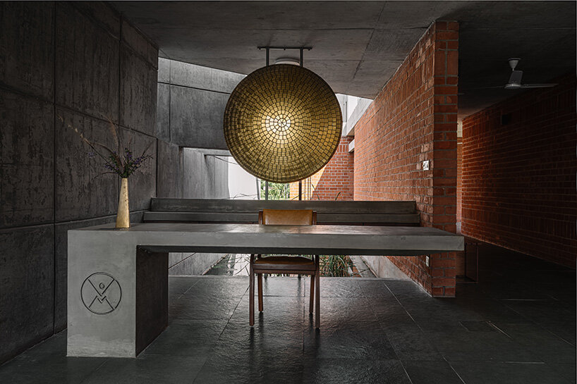 the sensorium court incorporates musical instruments that interact with natural elements