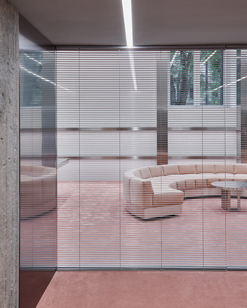 aluminum venetian blinds allow privacy in the meeting rooms
