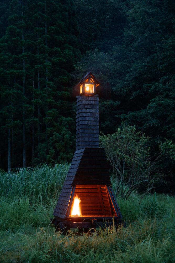 the design creates a sensory experience through warmth, light, and enclosure