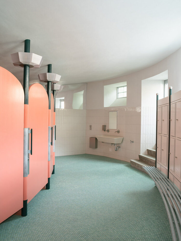 the cubicles themselves feature a sea-green lower finish