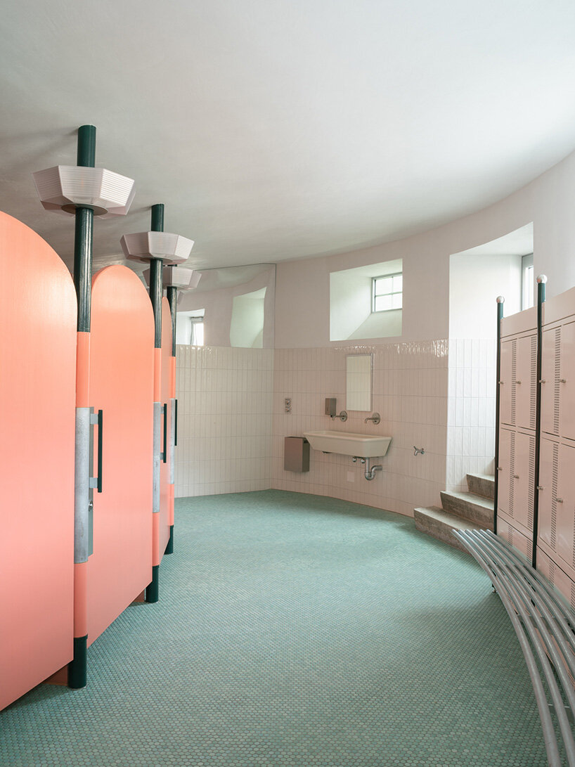 the cubicles themselves feature a sea-green lower finish