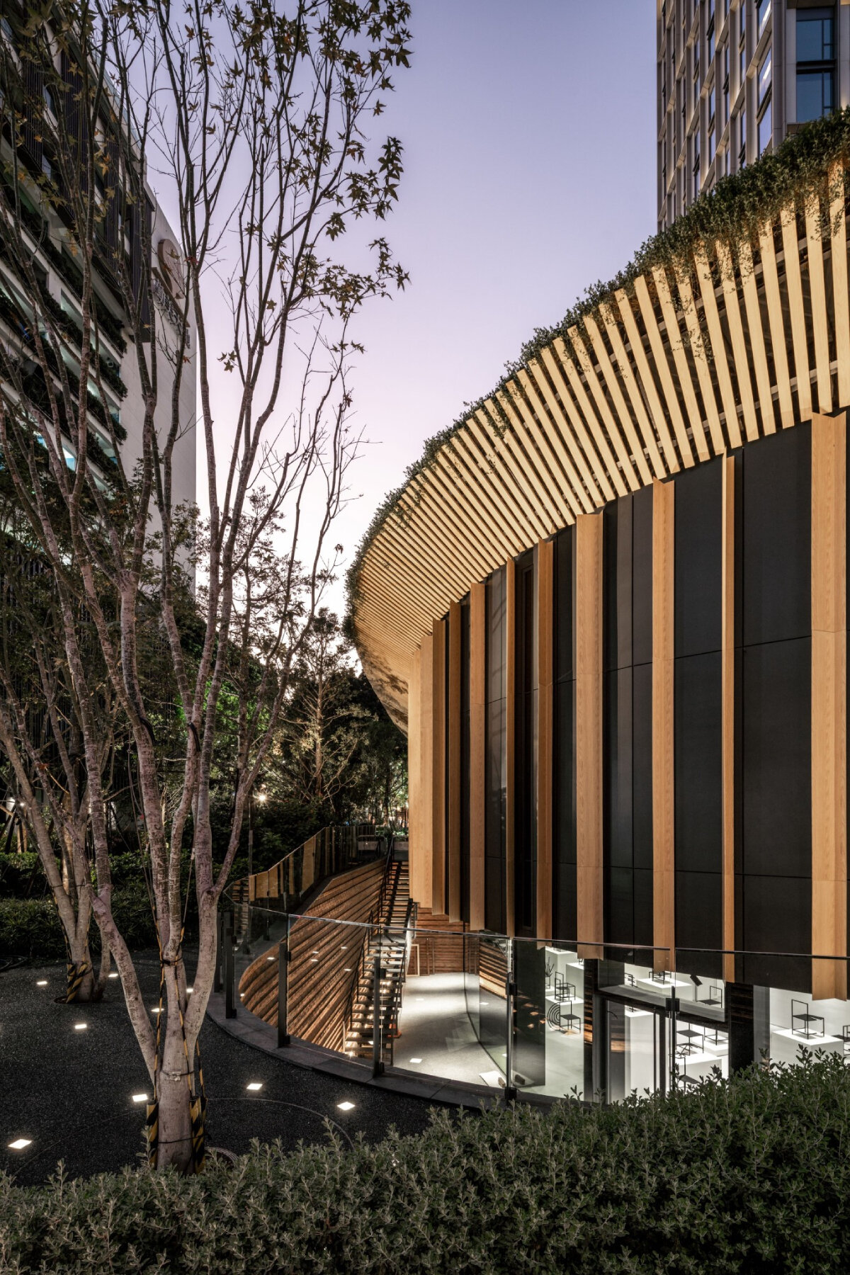 verdant roof doubling as public plaza tops kengo kuma's curving museum in taichung, taiwan