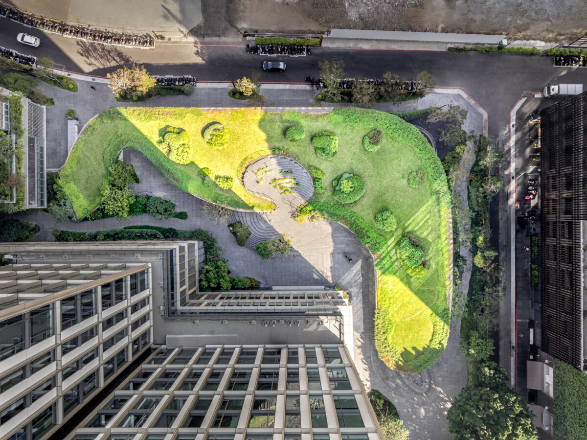 verdant roof doubling as public plaza tops kengo kuma's curving museum in taichung, taiwan