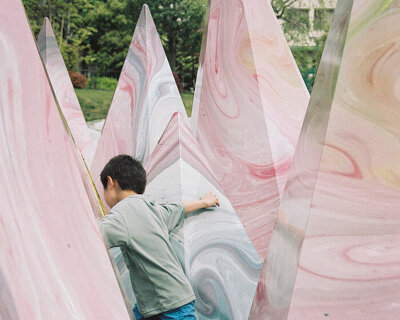 colors swirl across the peaks of suzuko yamada architects' marble mountain playset in tokyo