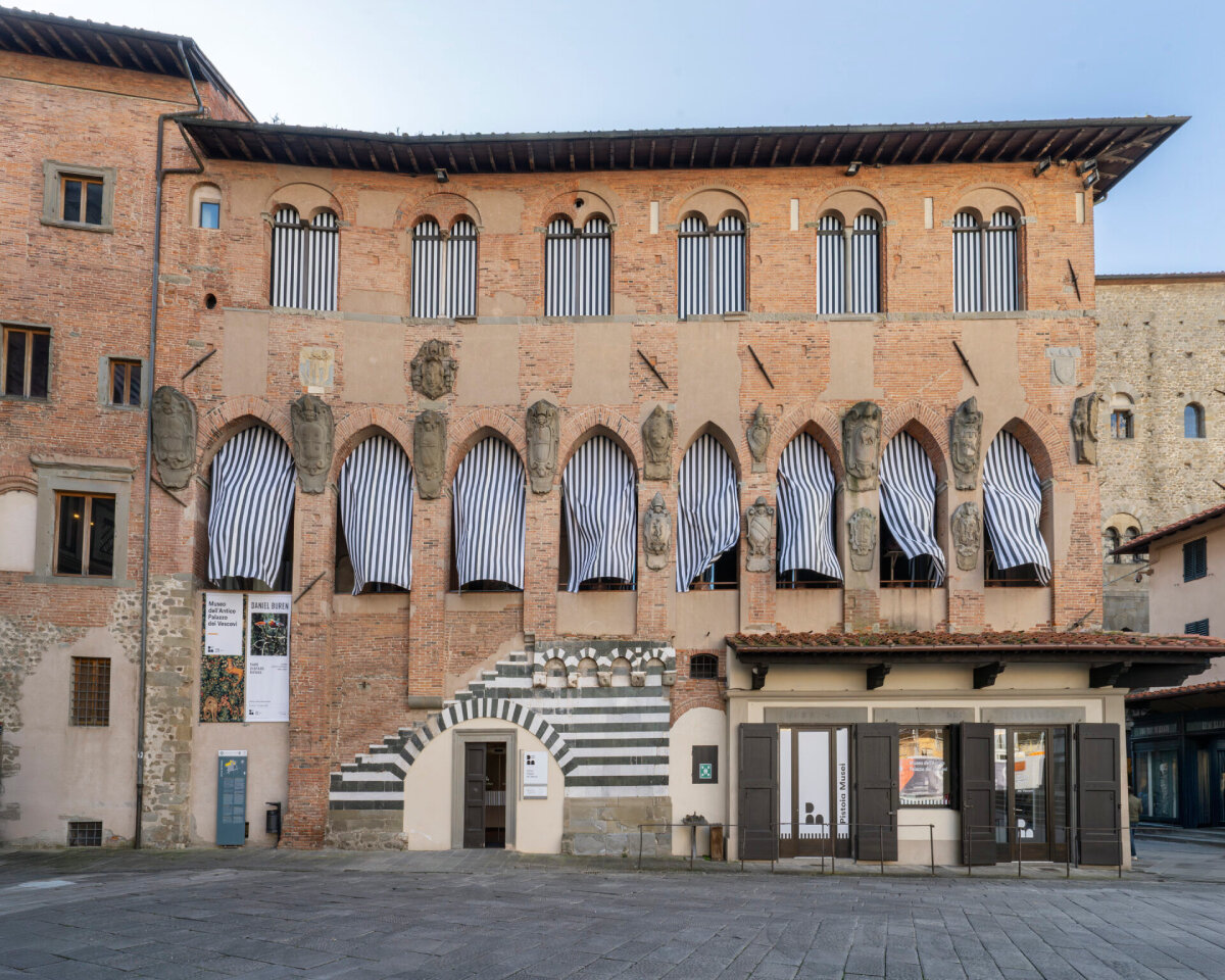 daniel buren's stripy optical interventions take over historic palazzo in italy