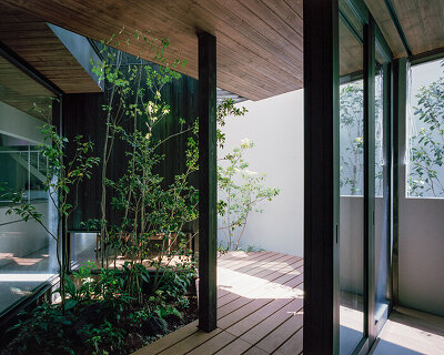 zigzagging corridor divides fujiwaramuro architects' house in fujiidera, japan