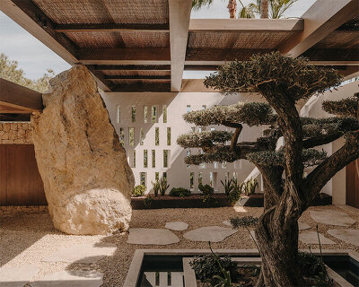 k-studio transforms traditional ibizan finca with flowing spaces and sculptural details