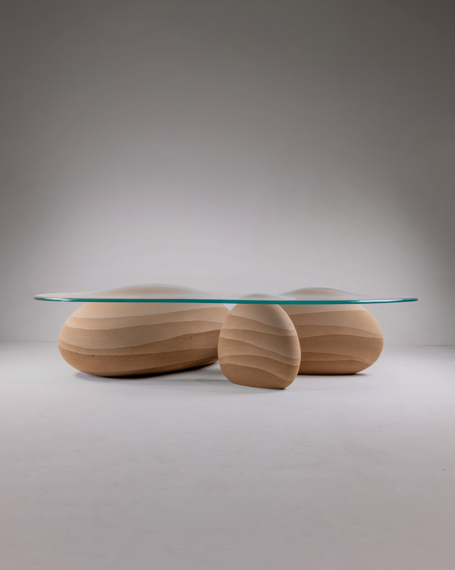 karim+elias' sculptural desert drop table evokes the image of droplets in the sand
