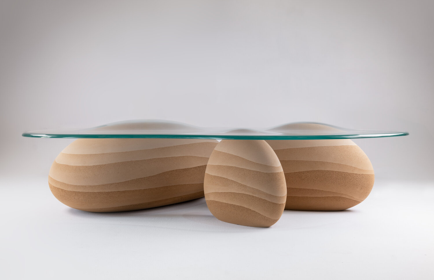 karim+elias' sculptural desert drop table evokes the image of droplets in the sand
