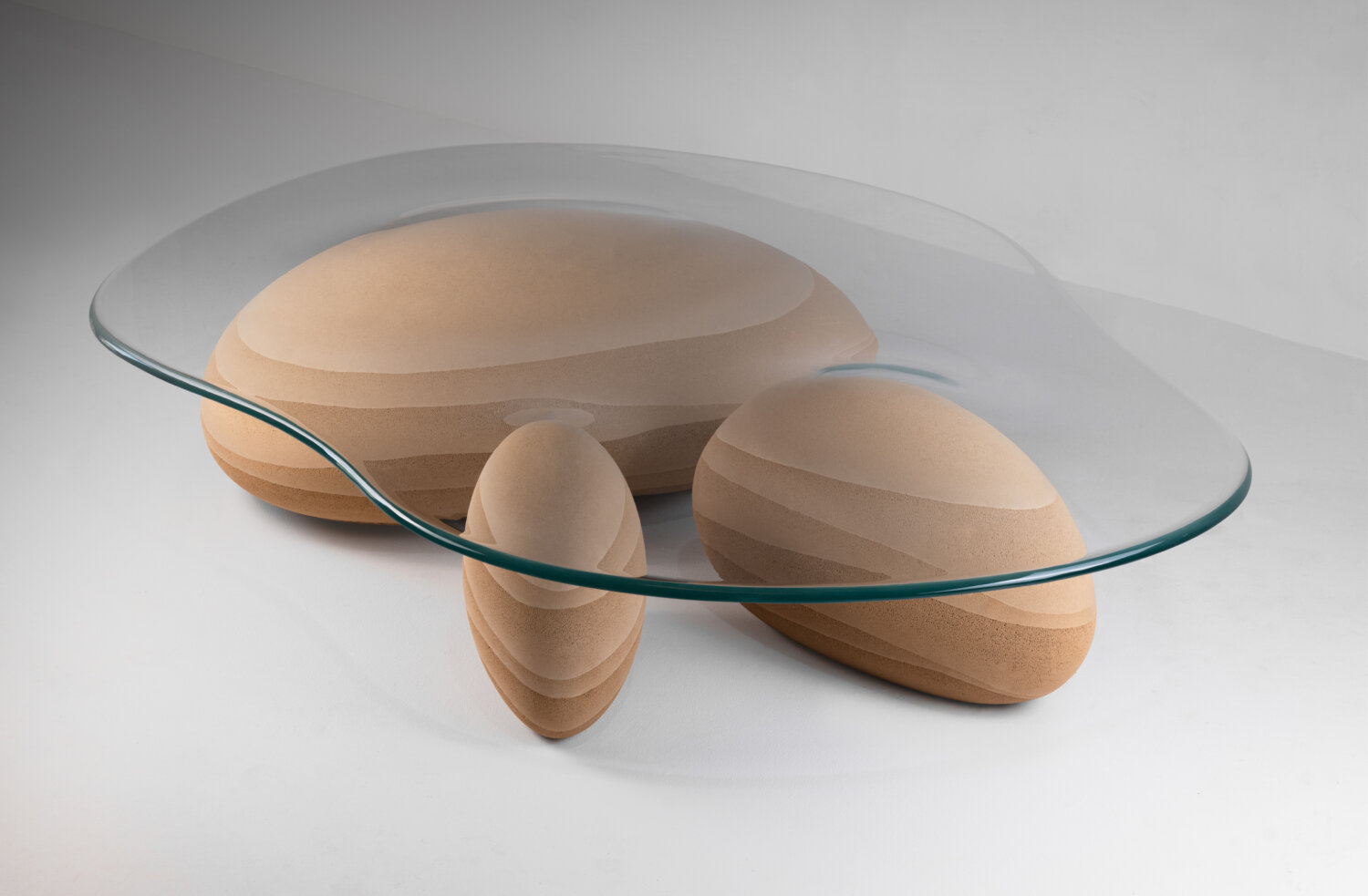 karim+elias' sculptural desert drop table evokes the image of droplets in the sand