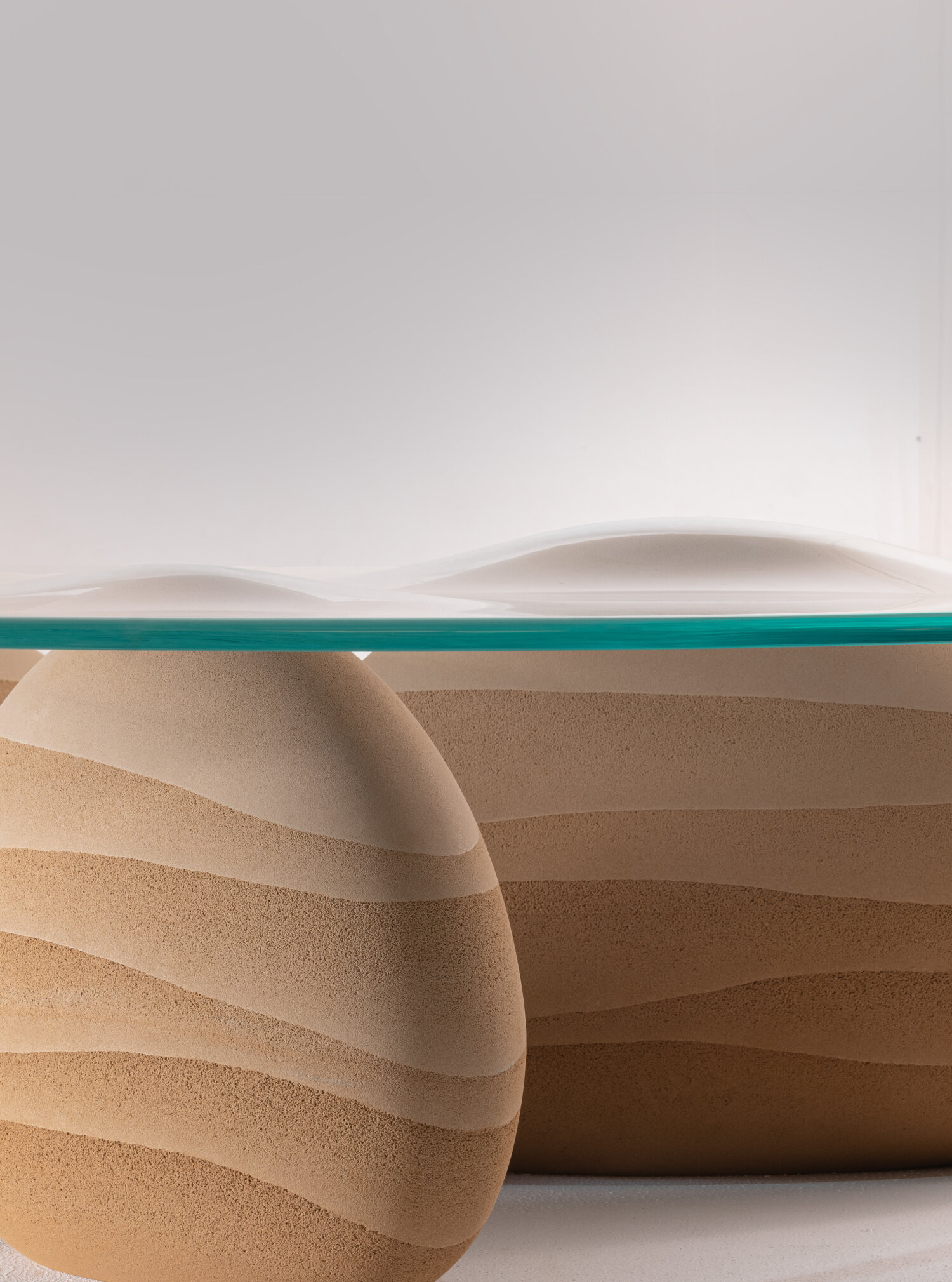 karim+elias' sculptural desert drop table evokes the image of droplets in the sand