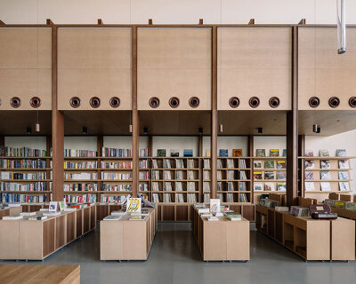 lllab. clads pageone vinyl concept bookstore's interiors with wood in beijing