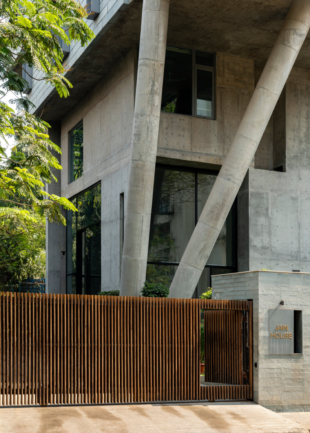 verandahs wrapped in adjustable perforated screens shape malik architecture's residential tower in mumbai